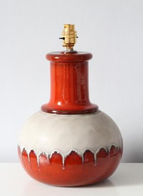Vintage ceramic table lamp in orange glaze