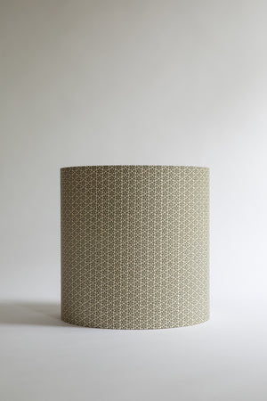 Versatile green-grey patterned paper drum lampshade. Suits so many room schemes.