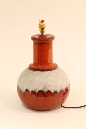 An unusual red and off white ceramic lampbase
