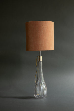 Tall cut glass table lamp and linen drum lampshade